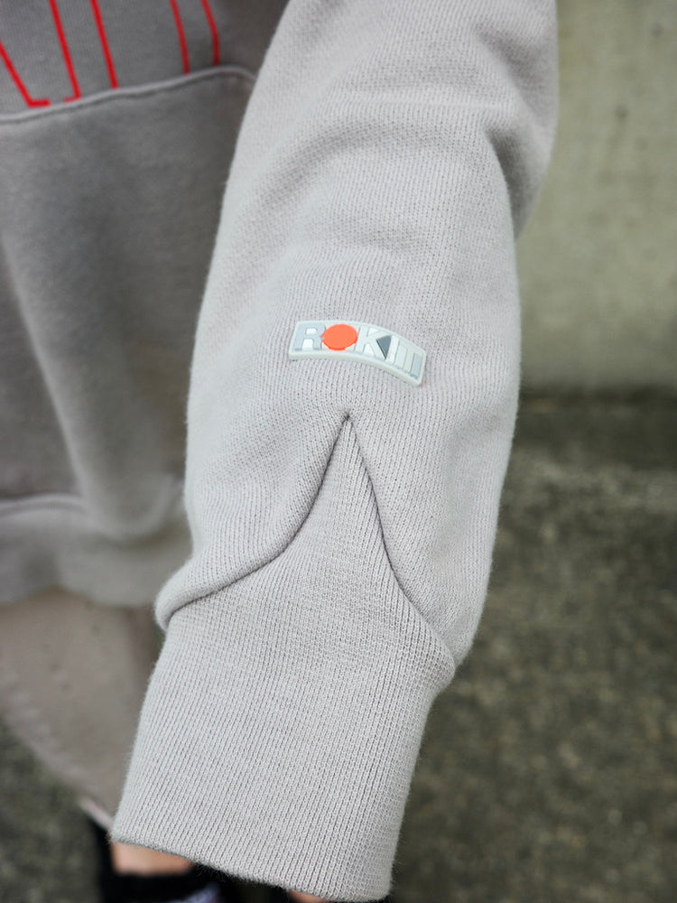 
                      
                        ROKIT バイカラーデザインフーディー
                      
                    
