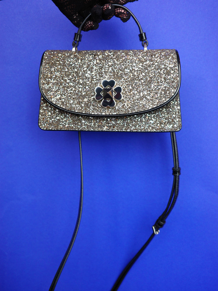 
                      
                        KATE SPADE グリッターエナメルハンドバッグ
                      
                    