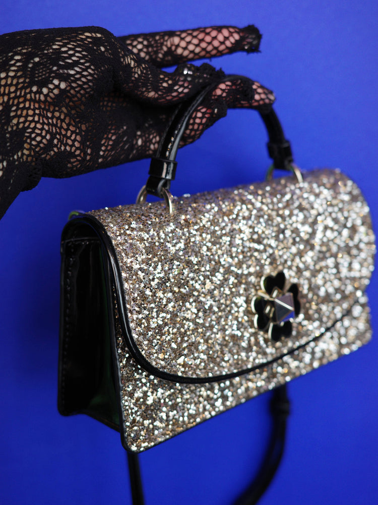 
                      
                        KATE SPADE グリッターエナメルハンドバッグ
                      
                    